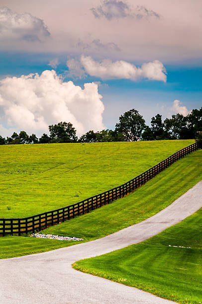 istock Fence along a driveway in rural York County, Pennsylvania. 530647859