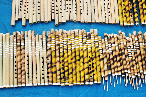 Flutes made of slender bamboo, artworks of handicraft, on display during Handicraft Fair in Kolkata - the biggest handicrafts fair in Asia.