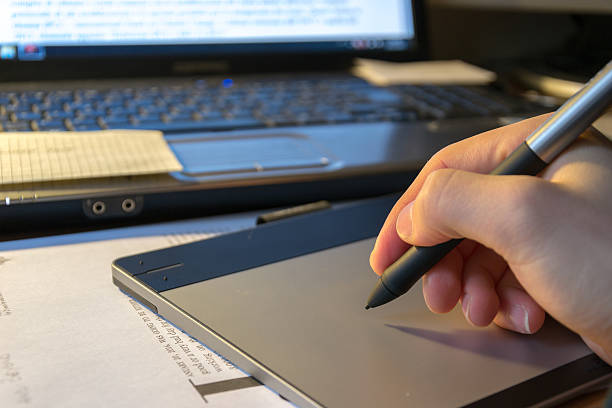 istock Close-up of a graphic tablet with his pen tool 530653215