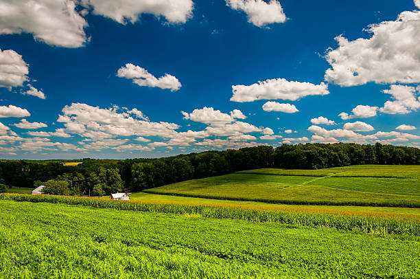 istock Clouds over farm fields in rural Southern York County, Pennsylva 530653257