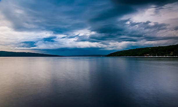 istock Dark storm clouds over Cayuga Lake, in Ithaca, New York. 530659647