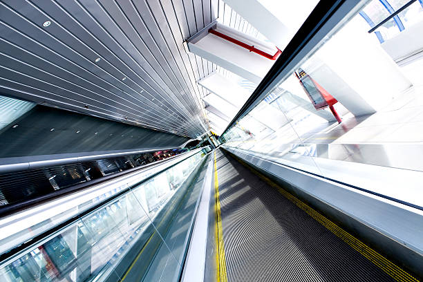 istock Moving escalator in the office hall 530663735
