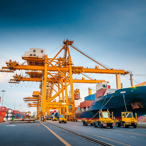 istock Container ship in the harbor in Asia , 530664029