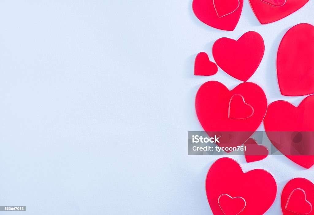 background red hearts from paper on the white table Arrangement Stock Photo