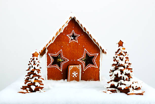 istock The hand-made eatable gingerbread house and New Year Trees 530668363