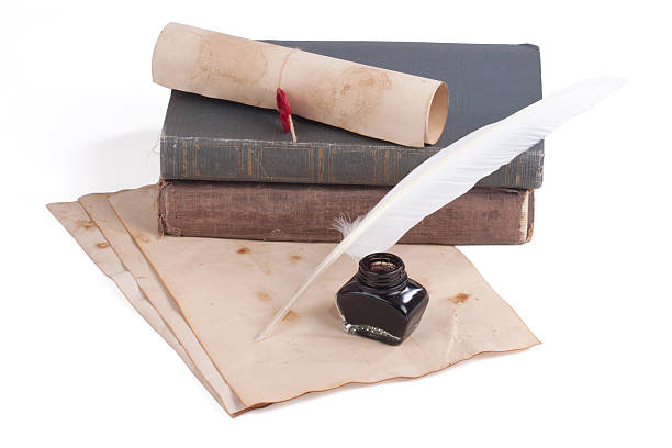 istock old books and pen 530668819
