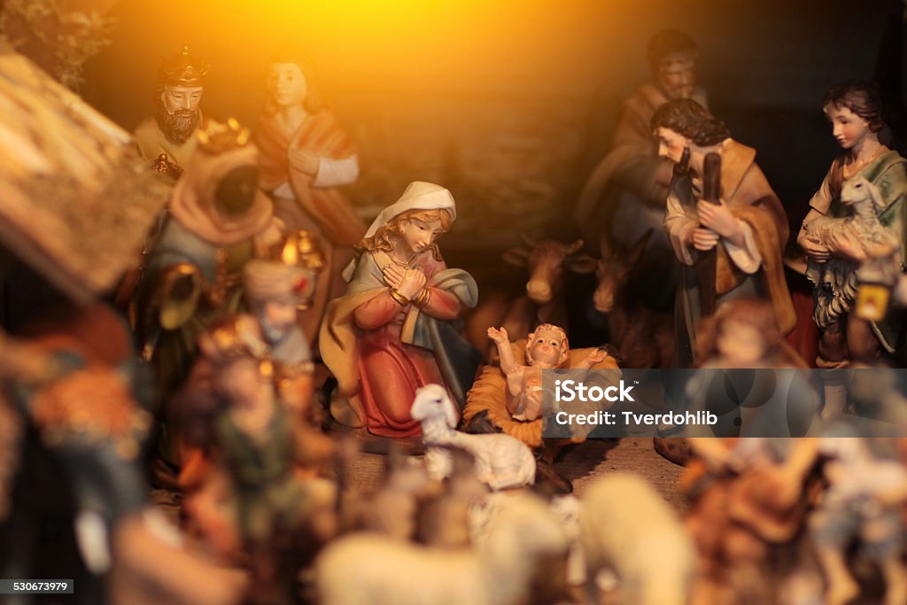 Christmas scene with figurines including Jesus, Mary, Joseph, king Christmas nativity scene with three Wise Men presenting gifts to baby Jesus Nativity Scene Stock Photo