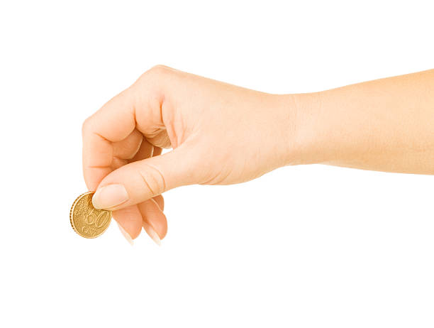 istock hand with coin on a white background 530674201