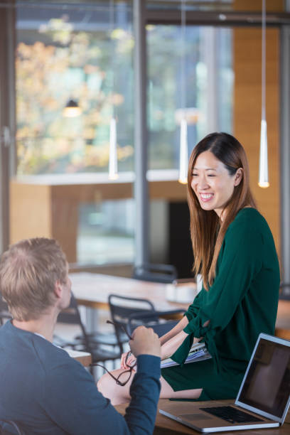 istock Business people talking at office desk 530682107