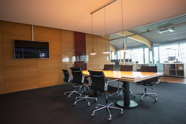 istock Conference table in empty office meeting room 530682165