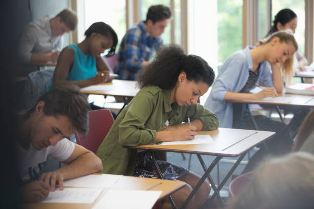 istock View of students sitting at desks during test in classroom 530683291