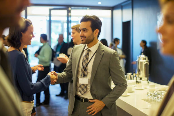 istock Business people shaking hands during reception in office 530686043