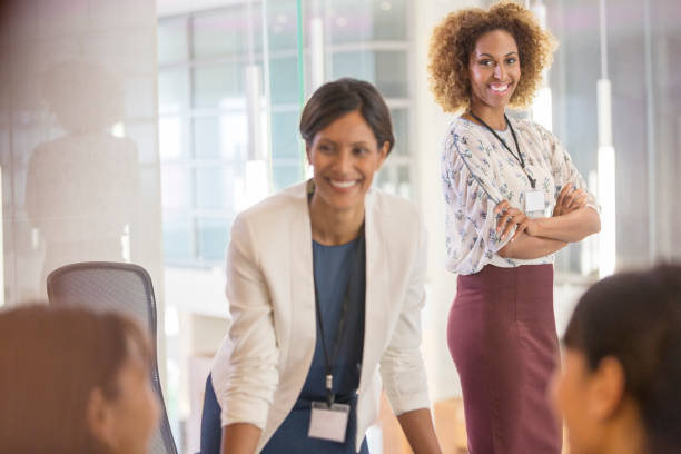 istock Two women standing in conference room 530686205