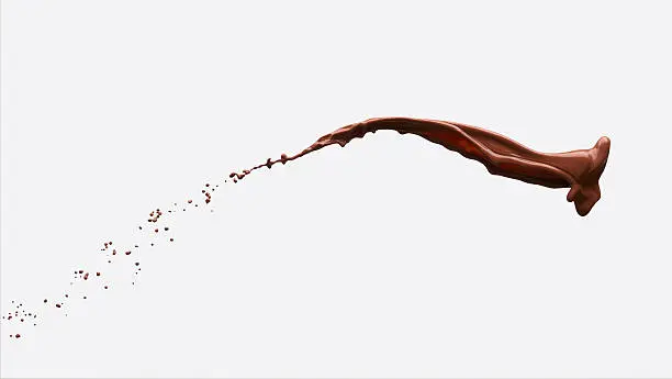 Photo of chocolate splash with clipping path