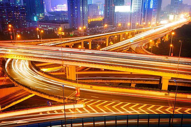istock shanghai interchange overpass and elevated road in nightfall 530694407