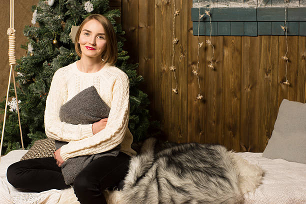 istock Beautiful girl in a sweater with rustic interior 530703279