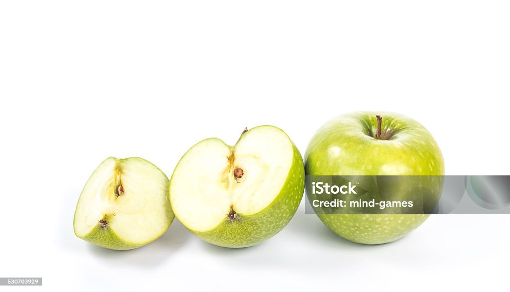 line of the whole apple, half and quarter line of the whole green apple, half and quarter Apple - Fruit Stock Photo