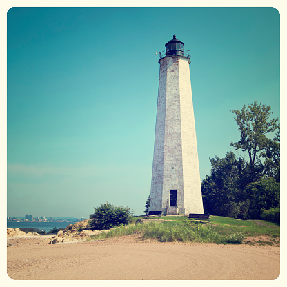 Five Mile Lighthouse in New Haven on a beach with Instagram effect filter