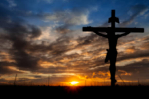 istock Jesus on the Cross blur background 530707529