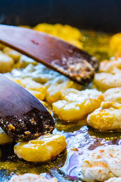 Frog legs cooking stock photo