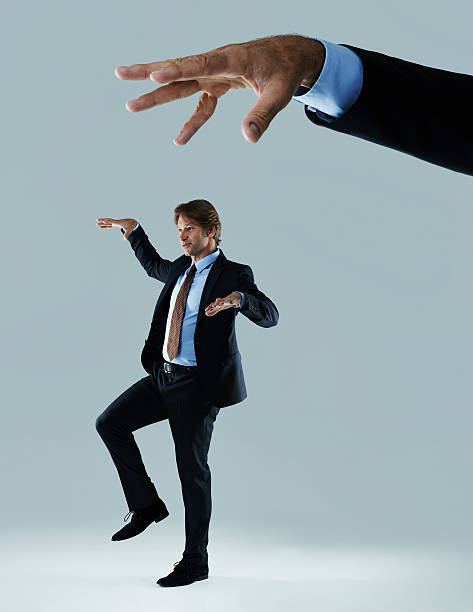 istock Just a puppet for the corporations 530710617