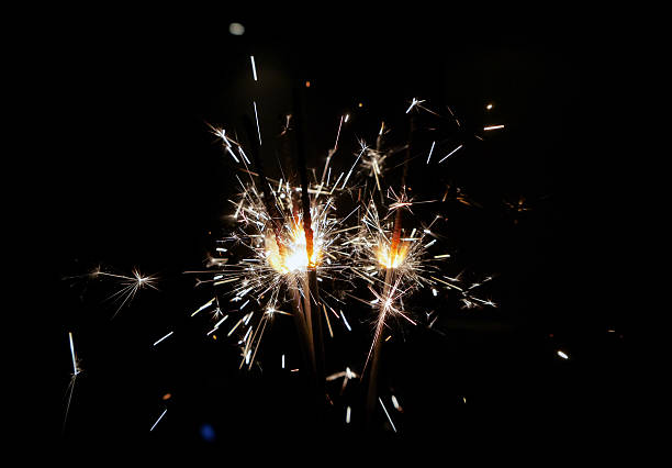 istock Burning Bengal lights in the hand of a man 530716069