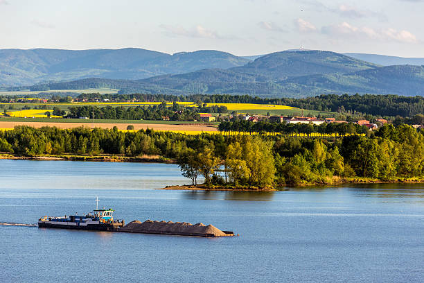 chiatta - industrial ship earth mover barge yellow foto e immagini stock