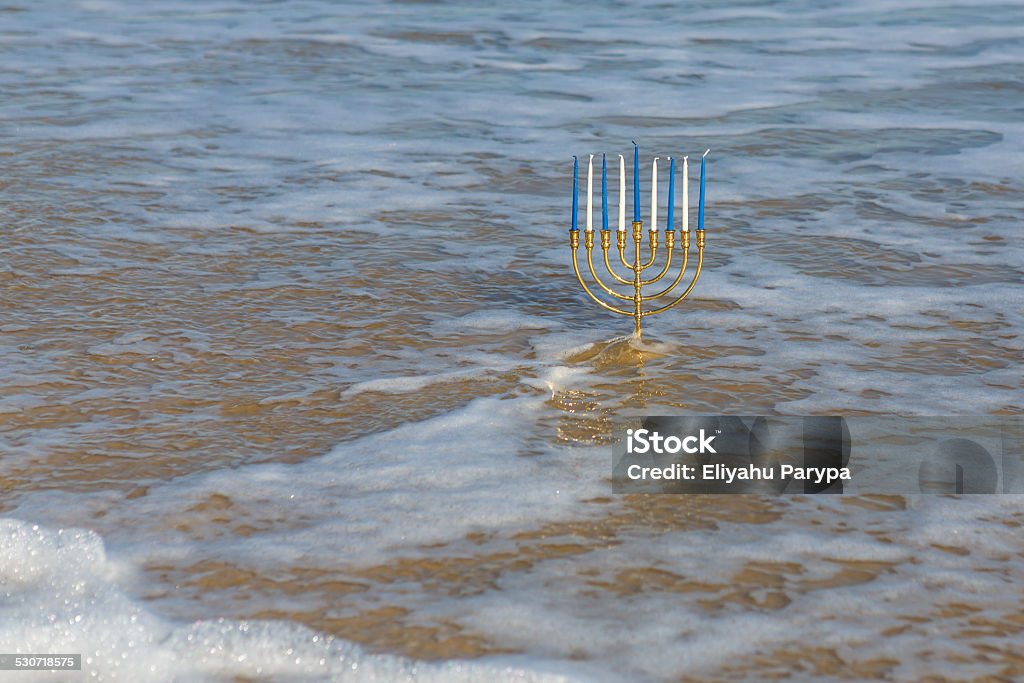 Chanukah Menorah on the beach Beach Stock Photo