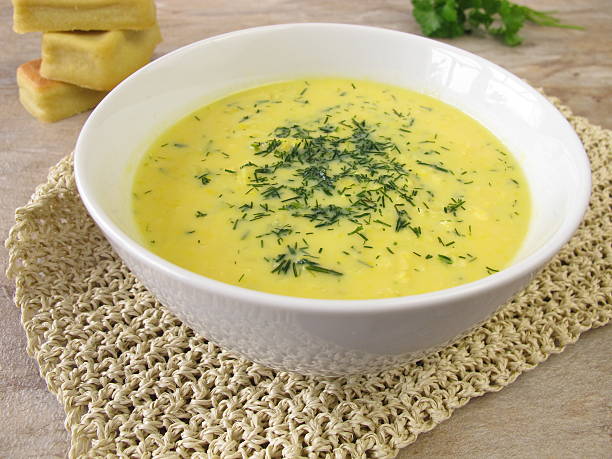 istock Corn cream soup with garden herbs 530719447