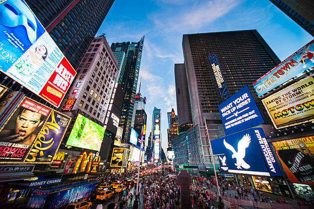 People crossing in Times Square in the night