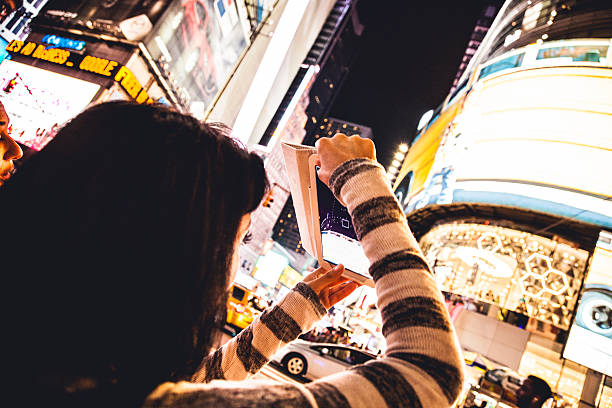 istock Taking pictures in Times Square 530719967
