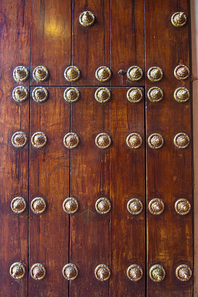istock wooden background with bronze details 530728009
