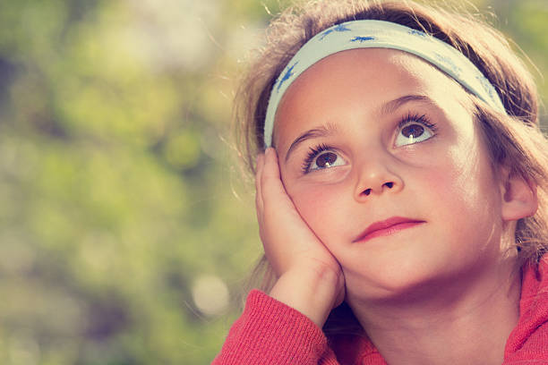 istock Bored little girl with a grumpy face 530729727