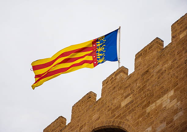 Flag of one of the regions of Spain - Valencia, on the fortress wall