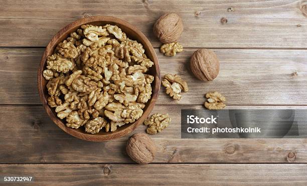 Walnuts In Wooden Bowl Stock Photo - Download Image Now - Walnut, Bowl, On Top Of