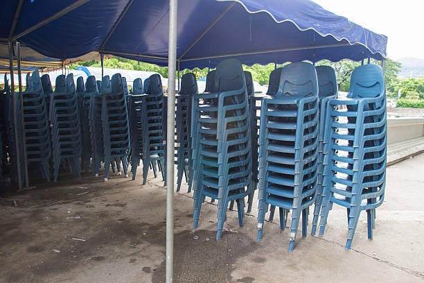 istock stack of blue plastic chair for banquet 530733141