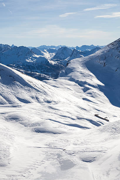 istock Huge snowy mountain range during sunny weather 530733661