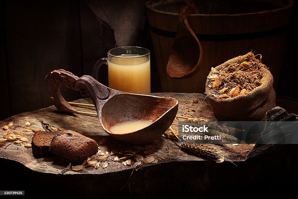 kvass Kvass, leavened yeast, brown bread and spikelets Barley Stock Photo