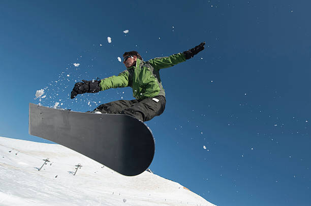 istock Skier with sun and mountains 530739977