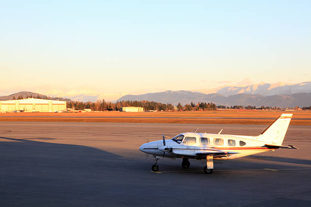 Commuter Plane Taking Off At Small Town Airport