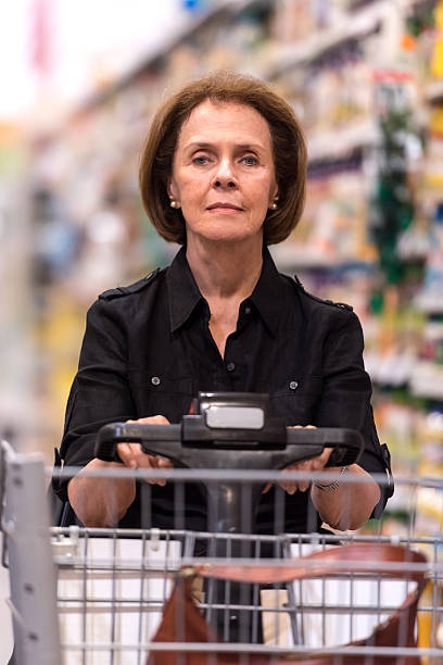 istock Senior Shopping at the supermarket 530740455