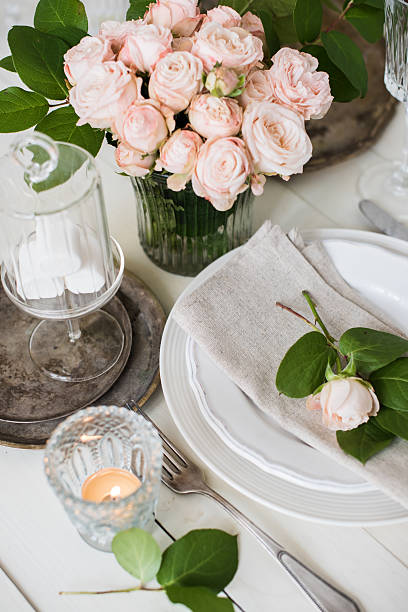 istock vintage wedding table decorations with roses, candles, cutlery a 530740710