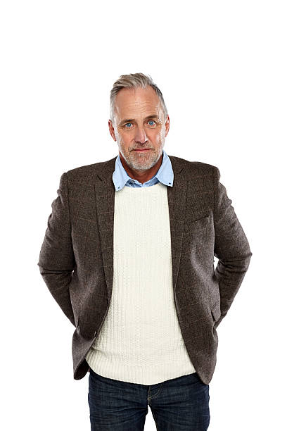 istock Handsome mature man standing against white 530740827