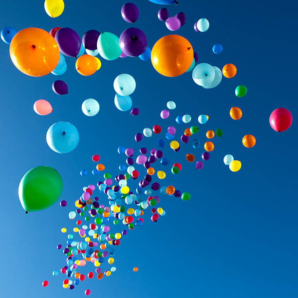 istock Colorful Balloons flying in the sky party 530740906