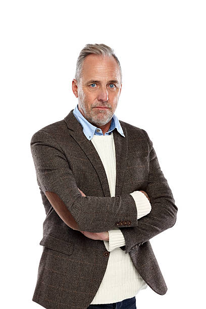 istock Handsome mature man standing with his arms crossed 530741085