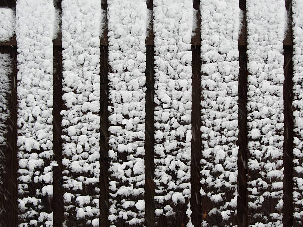 istock Snow on the fence texture 530741121