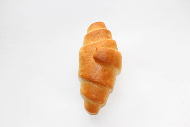 Isolated butter croissant on a white background.