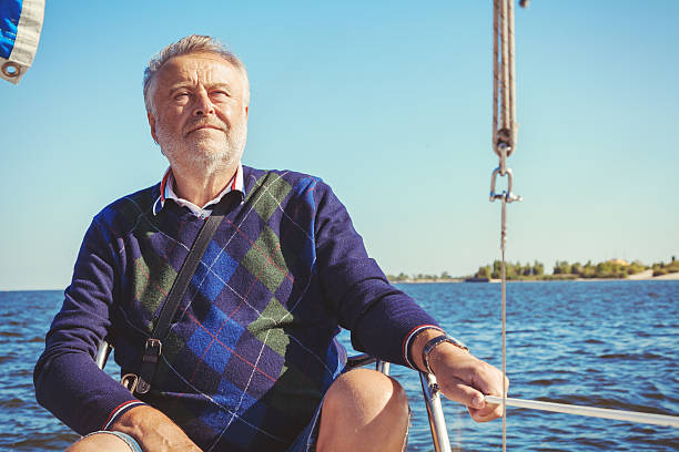 istock elderly man on yacht at sea 530742750