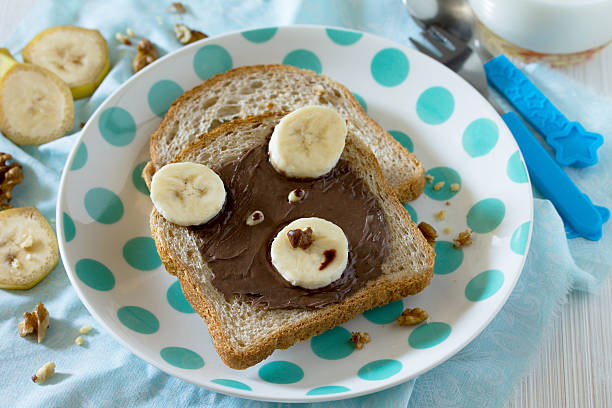 istock Bread with chocolate cream bear children for breakfast 530743182