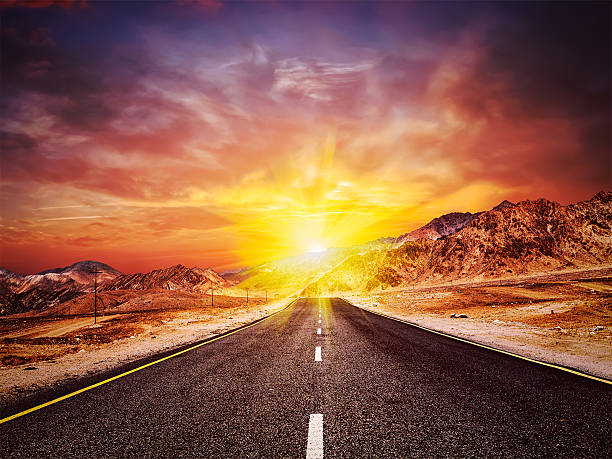 istock Road  in Himalayas with mountains 530744118